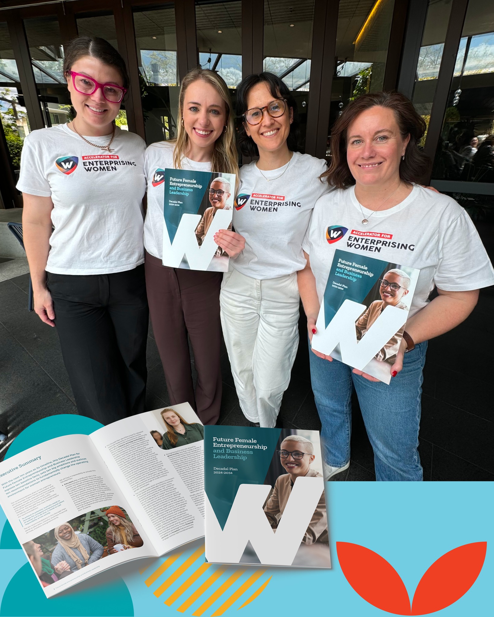 Four women smiling, wearing matching "Womenprizing" t-shirts, each holding a brochure. They're standing outside a building. In the foreground, brochures and an open book are displayed, showcasing content related to entrepreneurship.